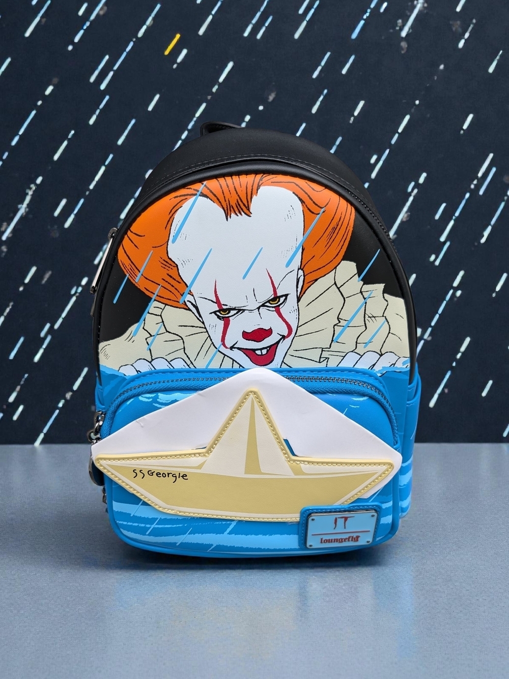 Loungefly IT Pennywise Georgie Raincoat Glow-in-the-Dark Mini Backpack (NWT)